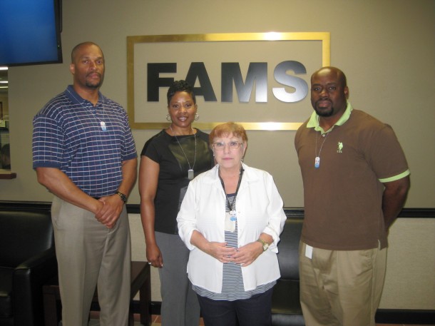 FAMS employees in Georgia show off their donor dog tags. (From left to right): Sharn Fuller (veteran), Cheryl Parks (veteran), Ann  Katz (mother of veterans) and Benjamin Smith (veteran).